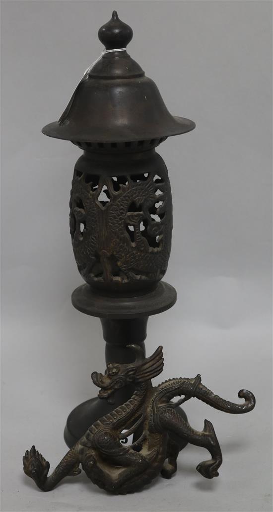 A bronze dragon and a bronze lantern